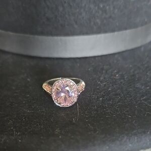 Pink Gemstone Halo Ring with Intricate Metalwork